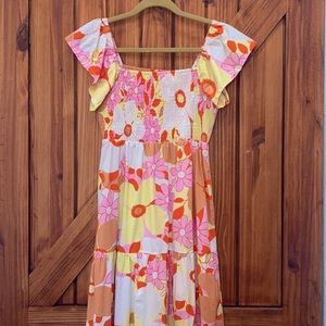 Brynn Arboretum dress. Ruffle sleeves, smocked chest, tiered layers on skirt